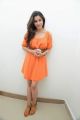 Madhurima Photos in Orange Dress at Healthy Curves, Hyderabad