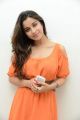 Madhurima Banerjee Photos in Orange Dress at Healthy Curves Spa Launch