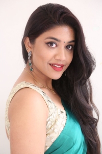 Actress Malavika Satheesan Pics @ Bommala Koluvu Movie Press Meet