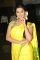 Actress Manasa Himavarsha in Traditional Yellow Silk Saree Photos