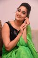 Anchor Manjusha in Green Saree Photos with Black Blouse