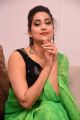 Anchor Manjusha in Black Blouse Green Saree Photos