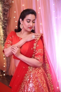 Telugu Anchor Manjusha Red Half Saree Photos