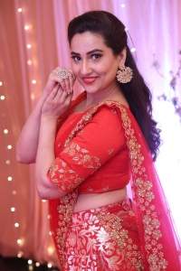 Telugu Anchor Manjusha Red Half Saree Photos