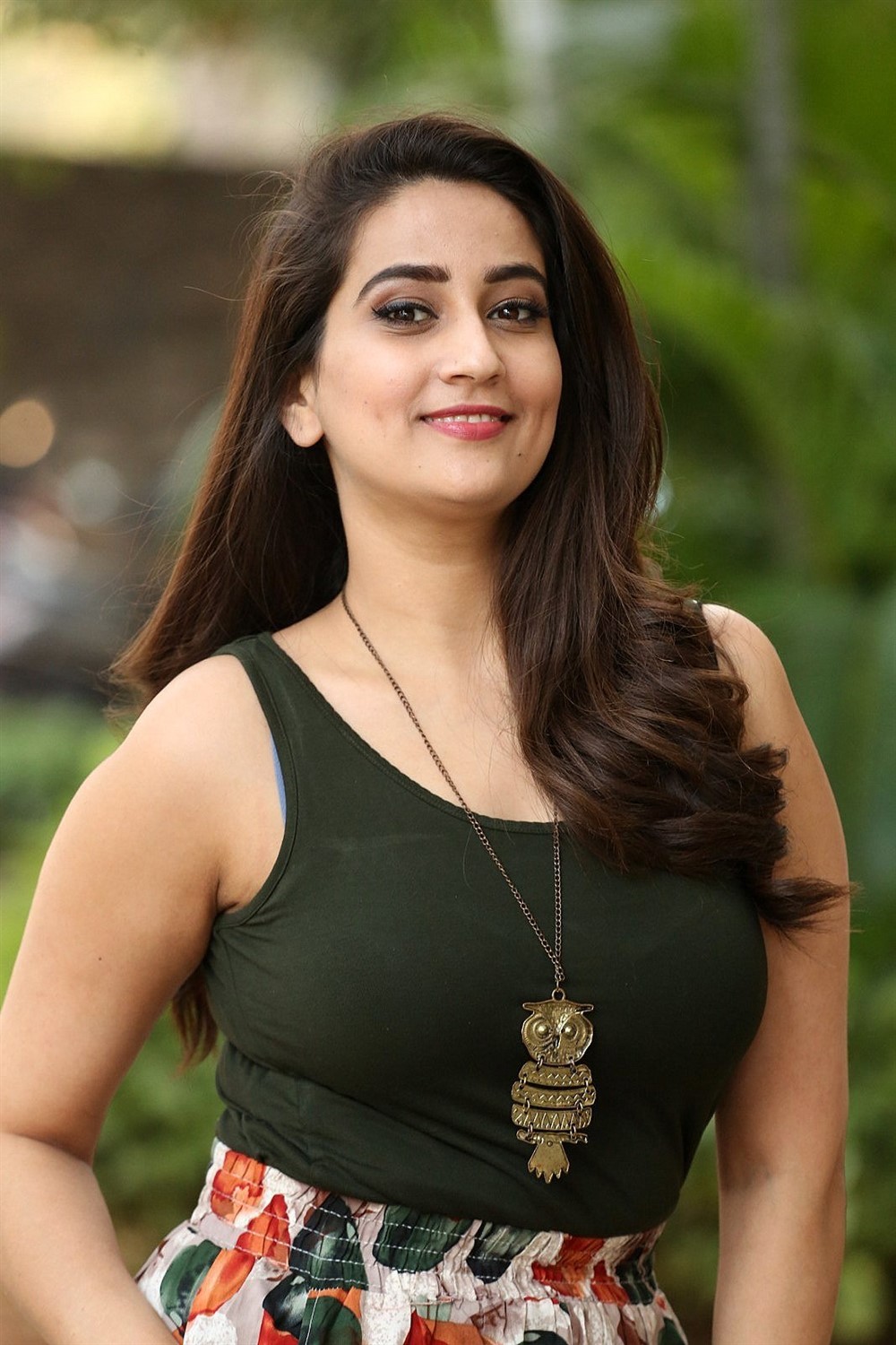 Telugu TV Anchor Manjusha Photos in Black T-Shirt & Floral Wide-Leg 3/4...