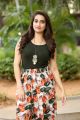 Telugu TV Anchor Manjusha Photos in Black T-Shirt & Floral Wide-Leg 3/4th Pants