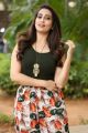 Telugu TV Anchor Manjusha Photos in Black T-Shirt & Floral Wide-Leg 3/4th Pants