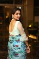 TV Anchor Manjusha Pics in White Sleeveless Blouse with Light Blue Floral Saree