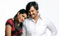 Rashmi Gautham, Lollu Sabha Jeeva in Mappillai Vinayagam Movie Stills