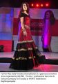 Parvathy Omanakuttan in Long Red Shoulderless Dress