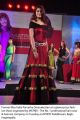 Parvathy Omanakuttan in Long Red Shoulderless Dress