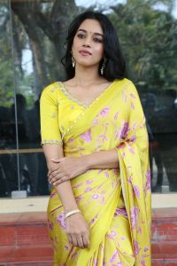 Actress Mirnalini Ravi Yellow Saree Pics @ Love Guru Press Meet