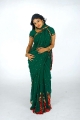 Actress Monica Cute In Green Saree Latest Photo Shoot Stills