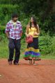 Yaswin, Nikitha Narayan in Nee Naan Mattum Movie Stills