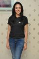 Actress Neha Shetty Photos in Black Top & Blue Jeans