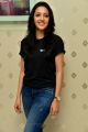 Actress Neha Shetty Photos in Black Top & Blue Jeans