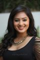 Actress Nikesha Patel Hot Stills in Black Tight Skirt