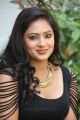 Actress Nikesha Patel Hot Stills in Tight Black Skirt