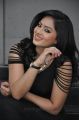 Actress Nikesha Patel Hot Stills in Black Tight Skirt