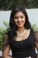 Actress Nikesha Patel Hot Stills in Black Tight Skirt