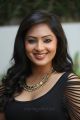 Actress Nikesha Patel Hot in Black Skirt Stills