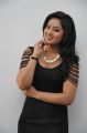 Actress Nikesha Patel Hot Stills in Black Tight Skirt