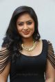 Actress Nikesha Patel Hot Stills in Tight Black Skirt