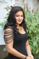 Actress Nikesha Patel Hot Stills in Black Tight Skirt