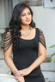 Actress Nikesha Patel Hot Stills in Tight Black Skirt