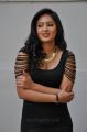 Actress Nikesha Patel Hot Stills in Black Tight Skirt