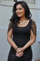 Actress Nikesha Patel Hot Stills in Black Tight Skirt