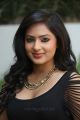 Actress Nikesha Patel Hot in Black Tight Skirt Stills