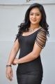 Actress Nikesha Patel Hot Stills in Black Tight Skirt