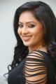 Actress Nikesha Patel Hot Stills in Tight Black Skirt