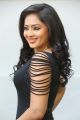 Actress Nikesha Patel Hot Stills in Black Tight Skirt