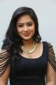 Actress Nikesha Patel Hot Stills in Black Tight Skirt