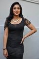 Actress Nikesha Patel Hot Stills in Black Tight Skirt