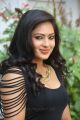 Actress Nikesha Patel Hot Stills in Tight Black Skirt