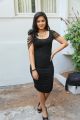 Actress Nikesha Patel Hot Stills in Black Tight Skirt