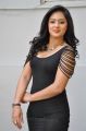 Actress Nikesha Patel Hot Stills in Black Tight Skirt