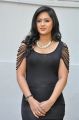 Actress Nikesha Patel Hot Stills in Black Tight Skirt