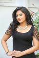 Actress Nikesha Patel Hot Stills in Black Tight Skirt