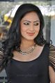 Actress Nikesha Patel Hot Stills in Tight Black Skirt