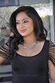 Actress Nikesha Patel Hot in Black Tight Skirt Stills