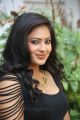 Actress Nikesha Patel Hot Stills in Tight Black Skirt