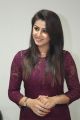 Actress Nikki Galrani Photos in Purple Dress @ Marakathamani Movie Interview