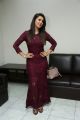 Actress Nikki Galrani Photos in Purple Dress @ Marakathamani Movie Interview