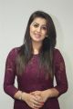 Actress Nikki Galrani Photos in Purple Dress @ Marakathamani Movie Interview