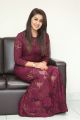 Actress Nikki Galrani Photos in Purple Dress @ Marakathamani Movie Interview