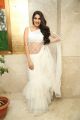 Actress Nikki Tamboli White Saree Pics @ Kanchana 3 Pre Release Event